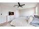 Bright bedroom featuring a comfortable bed and ample space at 10210 Mangrove Well Rd, Sun City Center, FL 33573