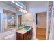 Bathroom featuring a granite vanity, glass vessel sink, and tile shower/tub combo at 10523 Cheval Pl, Lakewood Ranch, FL 34202