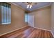Spacious bedroom with wood flooring and ceiling fan at 10523 Cheval Pl, Lakewood Ranch, FL 34202