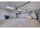 Large garage offering overhead storage and epoxy flooring at 10523 Cheval Pl, Lakewood Ranch, FL 34202