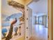 Hallway with painted mural and hardwood floors at 10523 Cheval Pl, Lakewood Ranch, FL 34202