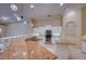 Kitchen features granite countertops and large island with sink at 10523 Cheval Pl, Lakewood Ranch, FL 34202