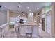 Gourmet kitchen, granite counters, large island and breakfast bar at 10523 Cheval Pl, Lakewood Ranch, FL 34202