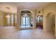 Spacious living room with high ceilings and a tile floor at 10523 Cheval Pl, Lakewood Ranch, FL 34202