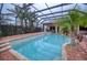 Relaxing pool and spa with screened enclosure at 10523 Cheval Pl, Lakewood Ranch, FL 34202