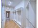 Large walk-in closet with ample shelving and hanging space at 10523 Cheval Pl, Lakewood Ranch, FL 34202