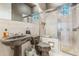 Bathroom boasts a large shower and updated vanity at 1101 Anclote Blvd, Tarpon Springs, FL 34689