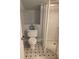 Bathroom with shower, toilet and tile floor at 1101 Anclote Blvd, Tarpon Springs, FL 34689