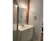Clean bathroom with white vanity and shower at 1101 Anclote Blvd, Tarpon Springs, FL 34689