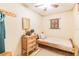 Small bedroom with wood furniture and Native American decor at 1101 Anclote Blvd, Tarpon Springs, FL 34689
