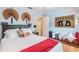 Relaxing bedroom with a window and cozy seating area at 1101 Anclote Blvd, Tarpon Springs, FL 34689