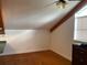 Simple bedroom with wood flooring and window at 1101 Anclote Blvd, Tarpon Springs, FL 34689