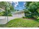 Three-car garage with additional storage space at 1101 Anclote Blvd, Tarpon Springs, FL 34689