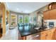 Kitchen island with sink, dishwasher, and breakfast bar seating at 1101 Anclote Blvd, Tarpon Springs, FL 34689