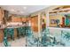 Spacious kitchen with island, stainless steel appliances, and ample cabinetry at 1101 Anclote Blvd, Tarpon Springs, FL 34689