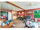 Small kitchenette with appliances and dining area at 1101 Anclote Blvd, Tarpon Springs, FL 34689
