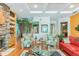 Living room with colorful furniture and unique decor at 1101 Anclote Blvd, Tarpon Springs, FL 34689