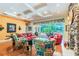 Bright living room with hardwood floors and view of pool at 1101 Anclote Blvd, Tarpon Springs, FL 34689