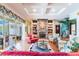 Relaxing living room with stone fireplace and hardwood floors at 1101 Anclote Blvd, Tarpon Springs, FL 34689