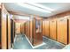 Room with multiple wooden lockers for storing tack at 1101 Anclote Blvd, Tarpon Springs, FL 34689