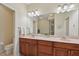 Double vanity bathroom with granite countertop at 1110 Beachcomber Ct # 1, Osprey, FL 34229