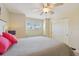 Bedroom with window seat and sliding door closet at 1110 Beachcomber Ct # 1, Osprey, FL 34229