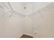 Large walk-in closet with wire shelving at 1110 Beachcomber Ct # 1, Osprey, FL 34229