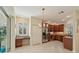 Open kitchen with stainless steel appliances and island at 1110 Beachcomber Ct # 1, Osprey, FL 34229