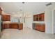Spacious kitchen boasts ample cabinetry and a breakfast bar at 1110 Beachcomber Ct # 1, Osprey, FL 34229