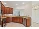 Spacious kitchen with ample cabinetry and granite countertops at 1110 Beachcomber Ct # 1, Osprey, FL 34229