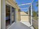 Private screened patio with sliding glass doors leading to bedroom at 1110 Beachcomber Ct # 1, Osprey, FL 34229