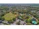 Aerial view showing community, lakes, and park at 11921 Whistling Way, Lakewood Ranch, FL 34202