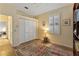 Guest bedroom with closet and window shutters at 11921 Whistling Way, Lakewood Ranch, FL 34202