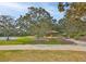 Community park with playground, basketball court, and walking paths at 11921 Whistling Way, Lakewood Ranch, FL 34202
