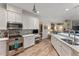 Spacious kitchen with white cabinets and stainless steel appliances at 11921 Whistling Way, Lakewood Ranch, FL 34202