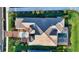 Bird's eye view of home, showcasing roofline and pool at 1210 Blue Shell Loop, Sarasota, FL 34240