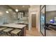 Contemporary wet bar featuring sleek cabinetry and quartz countertops at 1210 Blue Shell Loop, Sarasota, FL 34240