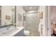 Clean bathroom with a walk-in shower and modern vanity at 1210 Blue Shell Loop, Sarasota, FL 34240