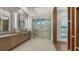 Spacious bathroom with a large walk-in shower and double vanity at 1210 Blue Shell Loop, Sarasota, FL 34240