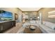 Spacious Gathering room with water views and comfortable seating at 1210 Blue Shell Loop, Sarasota, FL 34240