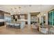 Gourmet kitchen featuring a large island, stainless steel appliances, and pendant lighting at 1210 Blue Shell Loop, Sarasota, FL 34240