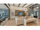 Luminous living area showcasing a sectional sofa, high ceilings, and water views at 1210 Blue Shell Loop, Sarasota, FL 34240