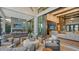 Spacious outdoor living area with comfortable seating and access to the interior at 1210 Blue Shell Loop, Sarasota, FL 34240