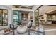 Outdoor patio with seating area, and view into the home at 1210 Blue Shell Loop, Sarasota, FL 34240