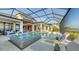 Luxury pool and spa with lake view at 1210 Blue Shell Loop, Sarasota, FL 34240