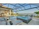 Luxury pool and spa with lake view at 1210 Blue Shell Loop, Sarasota, FL 34240