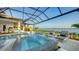 Luxury pool and spa with lake view at 1210 Blue Shell Loop, Sarasota, FL 34240