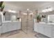 Bathroom boasts double vanity, large shower, and modern finishes at 12550 Ghiberti Cir # 101, Venice, FL 34293
