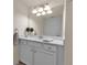 Modern bathroom with a vanity and a large mirror at 12550 Ghiberti Cir # 101, Venice, FL 34293