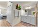 Bathroom features a vanity, mirror, and linen closet at 12550 Ghiberti Cir # 101, Venice, FL 34293